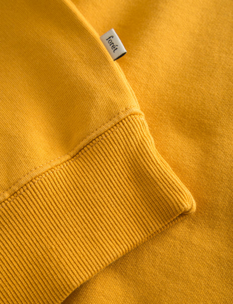 FORET ASH SWEATER AMBER logoflag